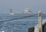 200714-N-FO574-1025 ARABIAN GULF (July 14, 2020) Logistics support vessel Maj. Gen. Charles P. Gross (LSV 5) transits the Arabian Gulf under escort by a Mark VI patrol boat, assigned to Commander, Task Force (CTF) 56, July 14, 2020. CTF 56 is responsible for planning and execution of expeditionary missions, including coastal riverine operations, in the U.S. 5th Fleet area of operations. (U.S. Navy photo by Mass Communication Specialist 3rd Class Jordan R. Bair/Released)