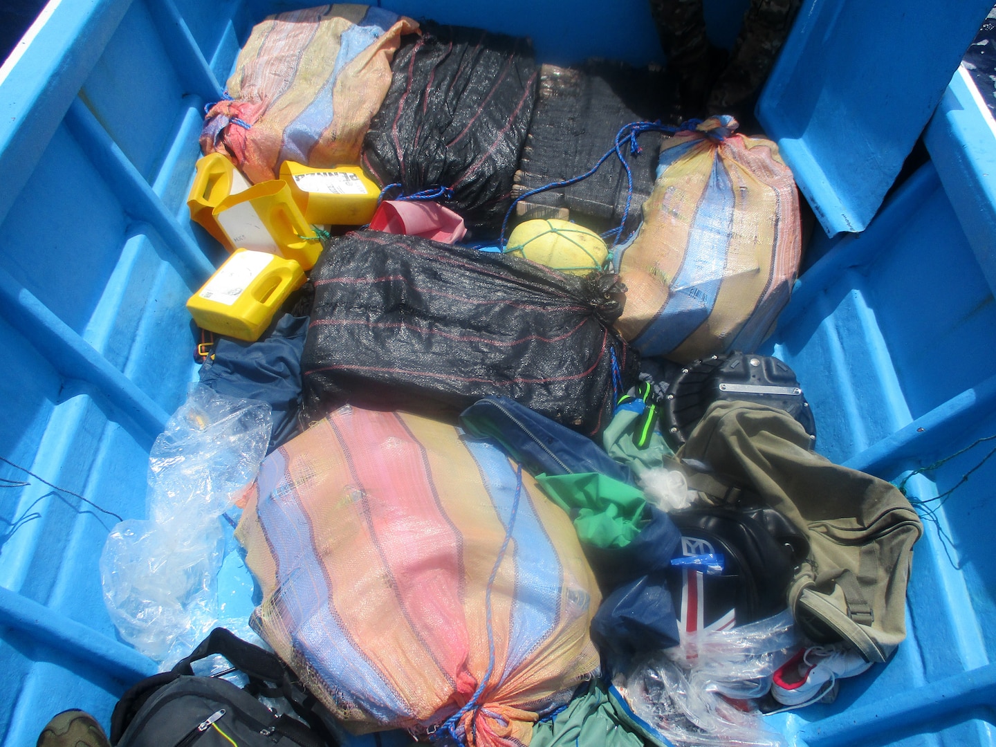 Suspected cocaine is shown on the deck of a go-fast-vessel.