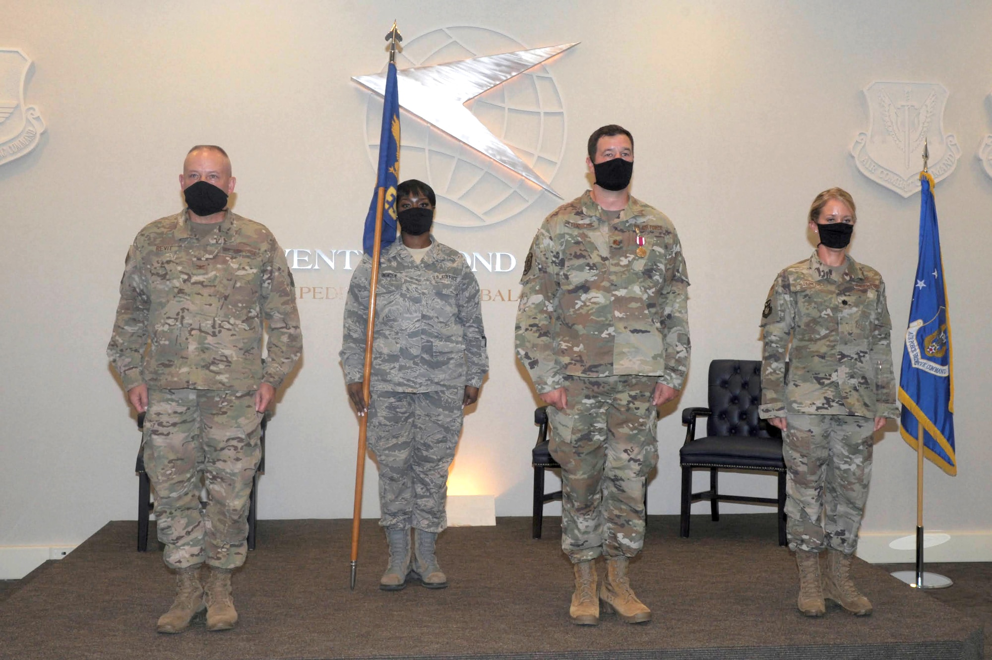 Members of the 94th Mission Support Group stand at attention Aug. 1, 2020, at the 22nd Air Force Headquarters, for the 4th Civil Engineer Squadron’s change of command ceremony. Lt. Col. Emily Steinfort took command from Maj. Joseph Thomas. (U.S. Air Force photo by Senior Airman Shelby Thurman)