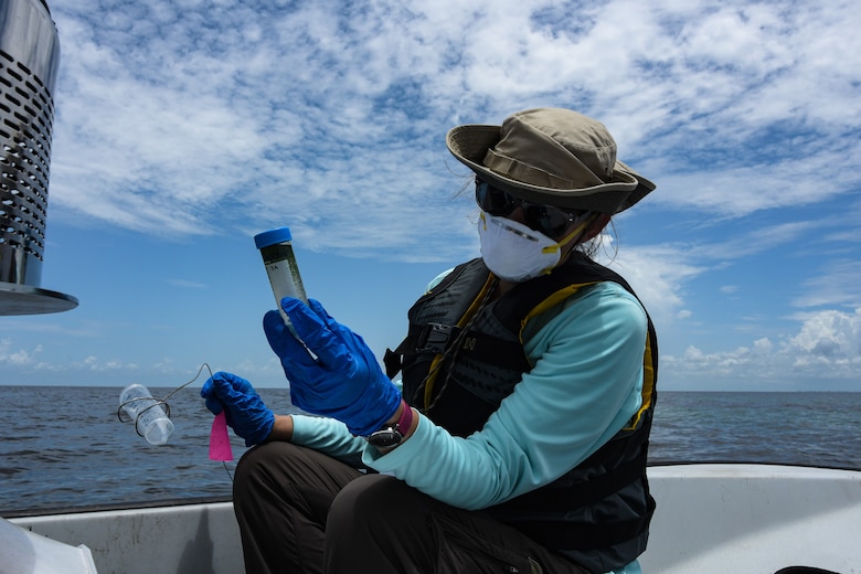 The U.S. Army Engineer Research and Development Center’s Research Community Planner, Angela Urban, collects blue green algae samples and data on Lake Okeechobee, Fla., July 27, 2020.