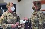 Maj. Gen. Tracy Norris, the Adjutant General of Texas (left), converses with U.S. Army North Commanding General, Lt. Gen. Laura Richardson (right), during a visit to the Texas State Operations Center in Austin, Texas, July 16, 2020.