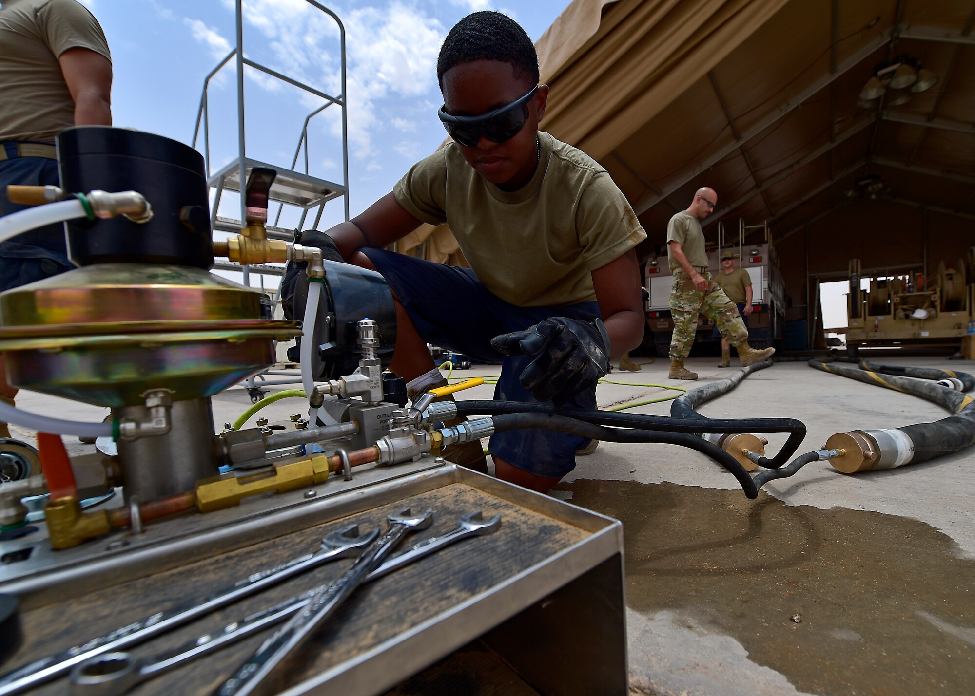Airmen from the 378th Expeditionary Logisitcs Readiness Squadron perform a hydrostatic test on fuel hoses at Prince Sultan Air Base, Kingdom of Saudi Arabia.