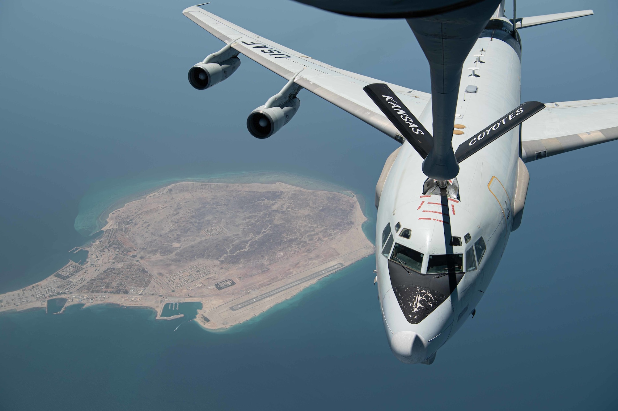 U.S. Air Force Airmen assigned to the 340th Expeditionary Air Refueling Squadron conduct an air refueling mission aboard a U.S. Air Force KC-135 Stratotanker with a U.S. Air Force E-3 Sentry, assigned to the 968th Expeditionary Airborne Air Control Squadron on July 25, 2020. Through joint exercises or direct operations, the 380th Air Expeditionary Wing continues to strengthen relationships with regional and coalition partners to defend the region. (U.S. Air Force photo by Staff Sgt. Justin Parsons)