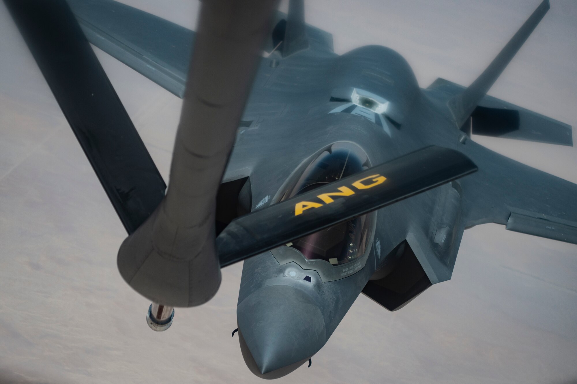 A U.S. Air Force KC-135 Stratotanker assigned to the 379th Air Expeditionary Wing prepares to refuel a U.S. Air Force F-35A Lightning II assigned to the 380th AEW over Southwest Asia, July 25, 2020. Through joint exercises or direct operations, the 380th Air Expeditionary Wing continues to strengthen relationships with regional and coalition partners to defend the region. (U.S. Air Force photo by Master Sgt. Larry E. Reid Jr.)