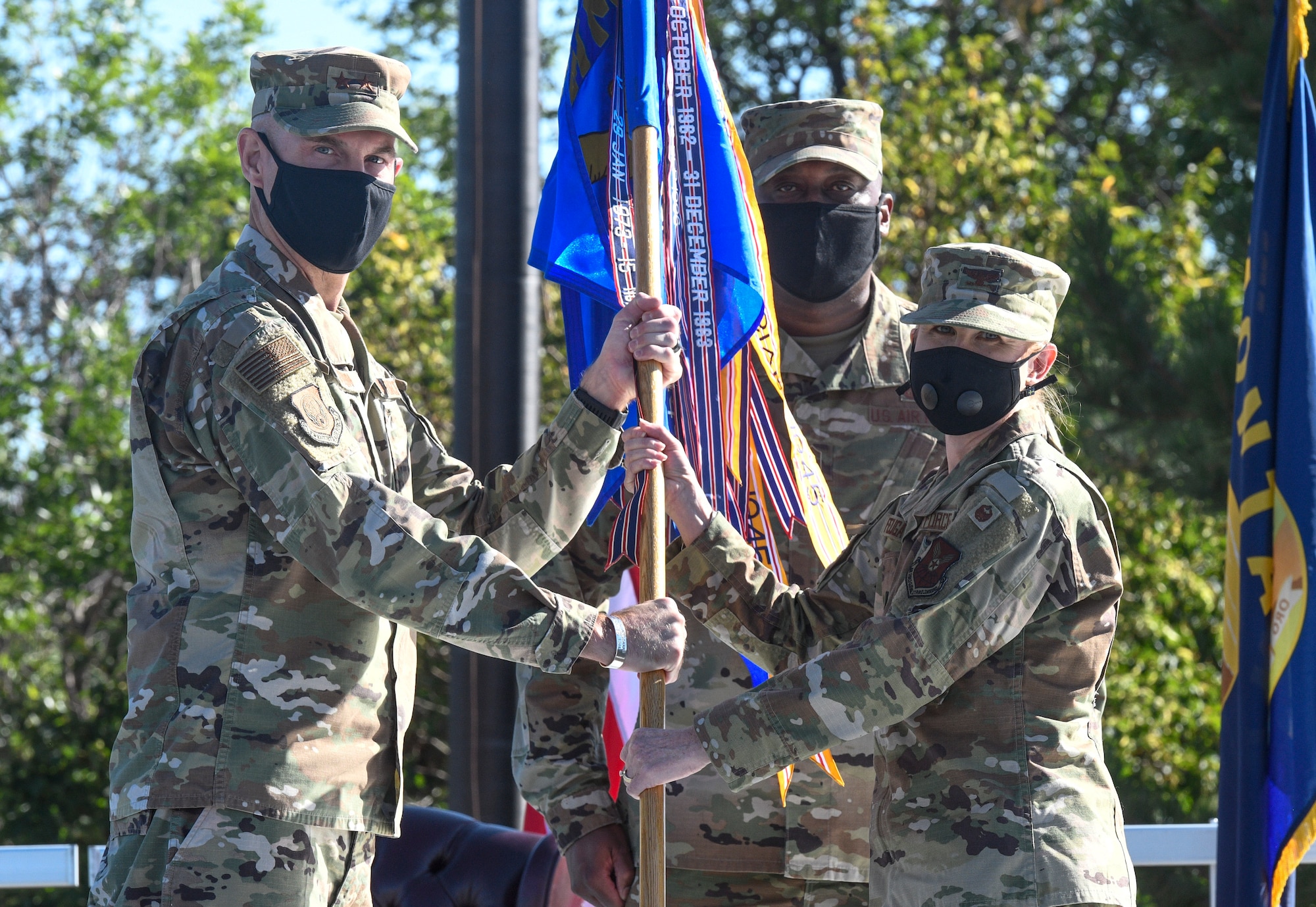 Col. Anita Feugate Opperman, right, accepts command of the 341st Missile Wing from Maj. Gen. Michael Lutton, 20th Air Force Commander during a change of command ceremony Aug. 5, 2020, at Malmstrom Air Force Base, Mont.