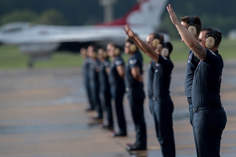 The U.S. Air Force Thunderbird team marshals the aircraft into parking spots on the flight line at Joint Base Langley-Eustis, Virginia, Aug. 5, 2020.