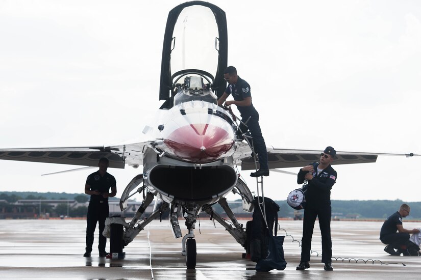 U.S. Air Force Thunderbird members perform post-flight checks and maintenance on the aircraft after arriving at Joint Base Langley-Eustis, Virginia, Aug. 5, 2020.