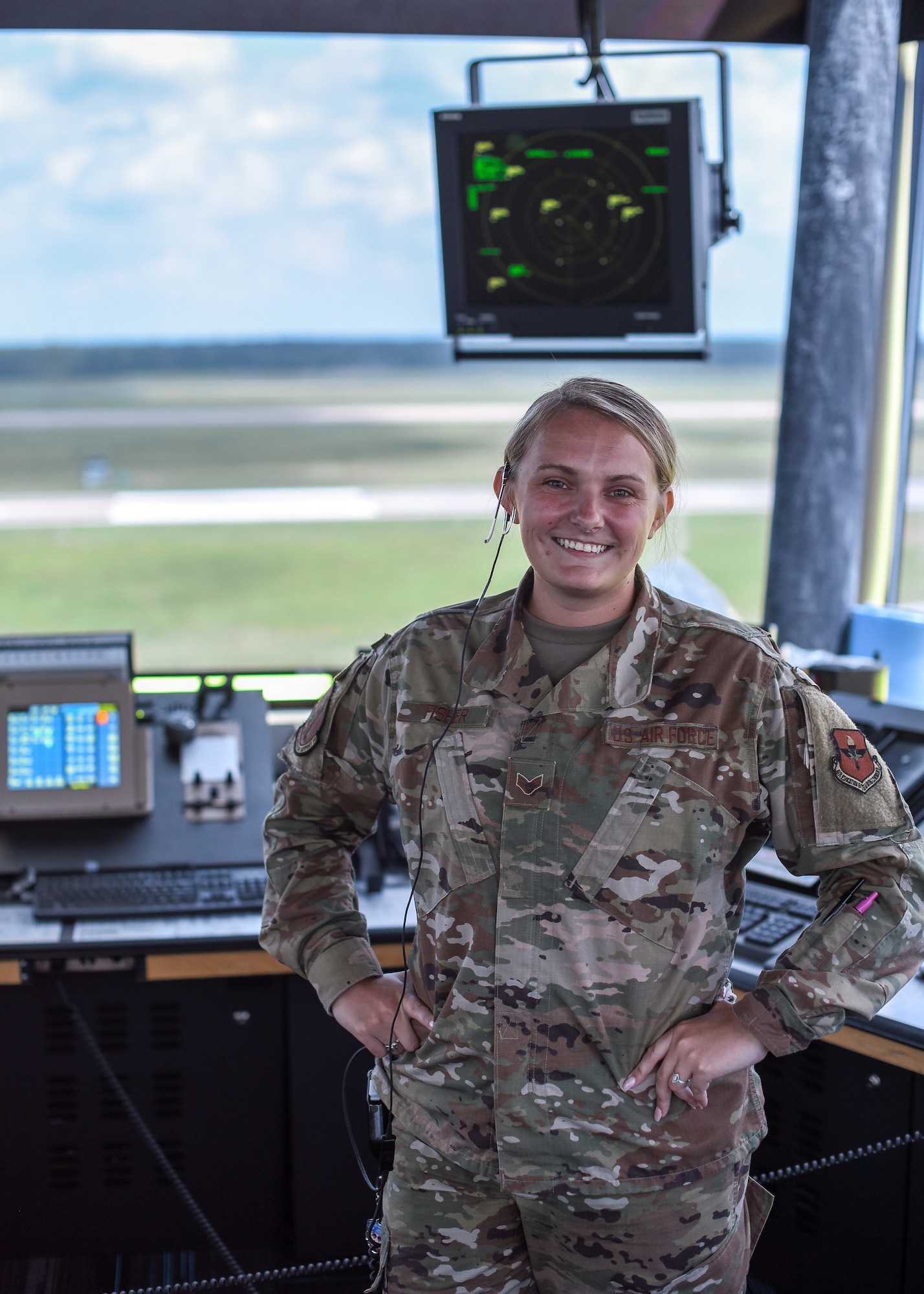 Senior Airman Miranda Fisher, 14th Operations Support Squadron Air Traffic Controller, poses for a photo August 4, 2020, on Columbus Air Force Base, Miss. The new Tower Coordinator position is vital in ensuring even safer and overall improved communication between controllers and from the tower to the pilots. (U.S. Air Force photo by Senior Airman Keith Holcomb)