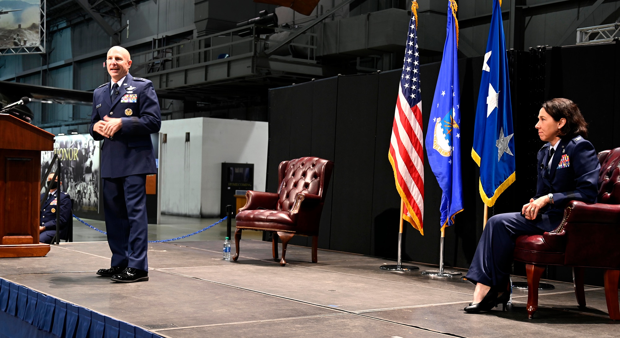 Lt. Gen. Carl Schaefer, Air Force Materiel Command Deputy Commander, speaks to the audience about the career and attributes of Col. Jeannine Ryder, Air Force Materiel Command Surgeon General, prior to her promotion to general officer Aug. 3 at the National Museum of the United States Air Force, Wright-Patterson Air Force Base, Ohio. (photo by Darrius Parker)