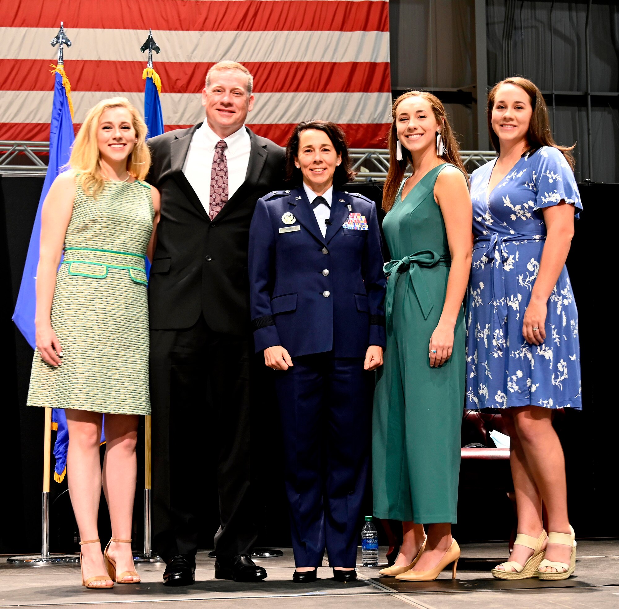Brig. Gen. Jeannine Ryder's family stands by her as she accepts her new rank,  Aug. 3 at the National Museum of the United States Air Force, Wright-Patterson Air Force Base, Ohio. (photo by Darrius Parker)