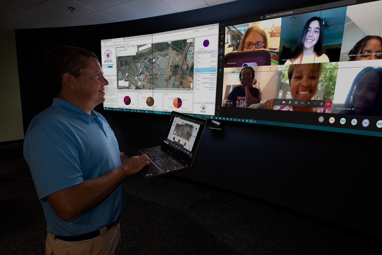 Naval Information Warfare Center (NIWC) Atlantic scientist, Todd Remmel shows his students how the data they collected during a week long class and can be used in geographic information systems.