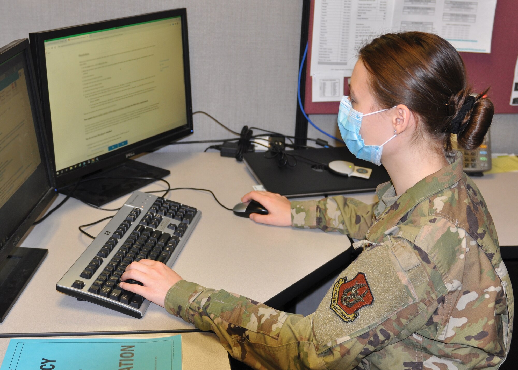 Senior Airman Britney Chinn, client systems technician, works full-time for the 445th Force Support Squadron’s communications flight. The communications flight was responsible for helping the entire 445th Airlift Wing transition to telework during the COVID-19 pandemic. Airmen like Chinn were on hand to provide remote support and expertise. (U.S. Air Force photo/1st Lt. Rachel Ingram).