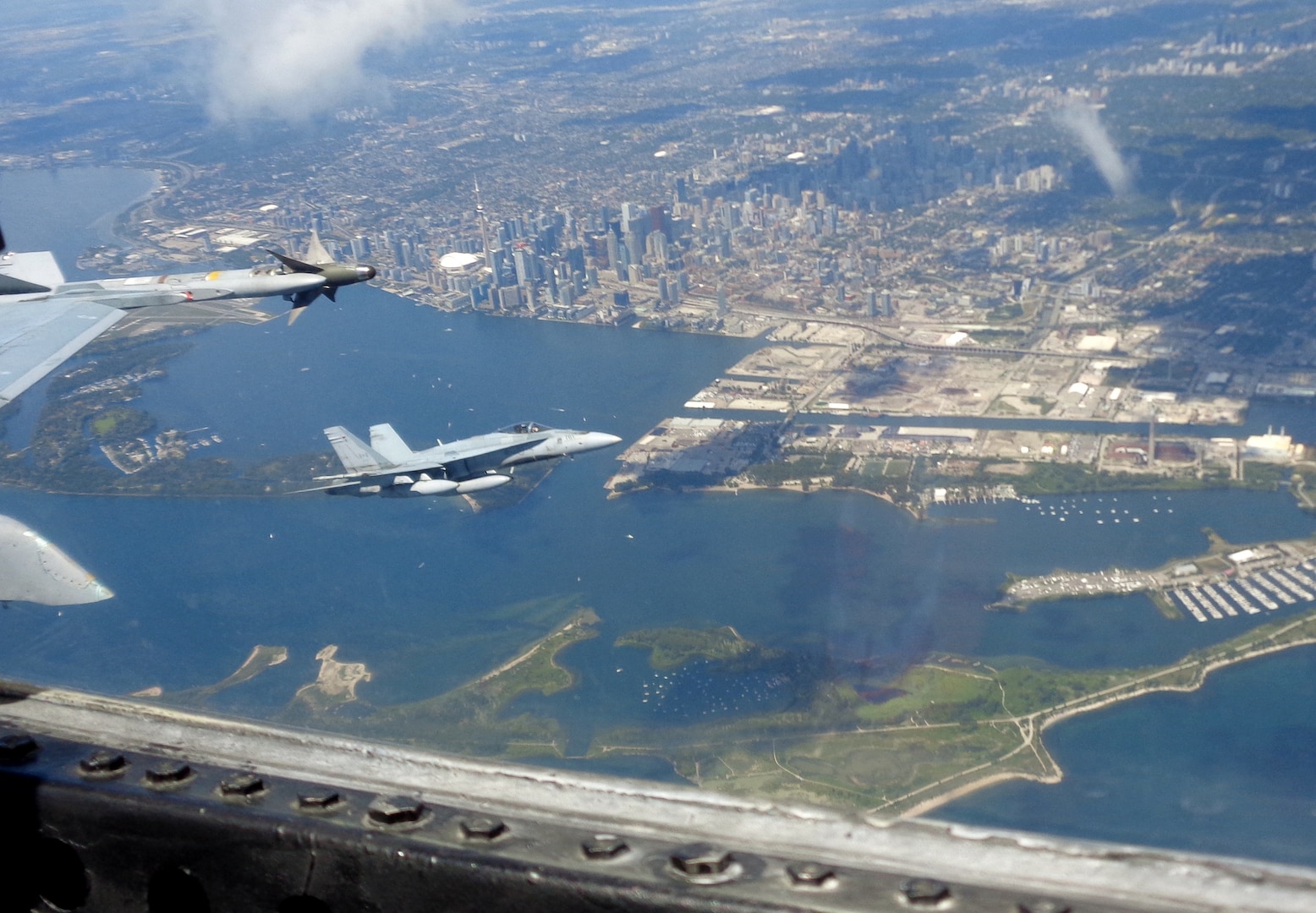 Royal Canadian Air Force CF-18 Hornets participate in binational NORAD air defence exercise over the Greater Toronto Area (GTA) on July 30, 2020.