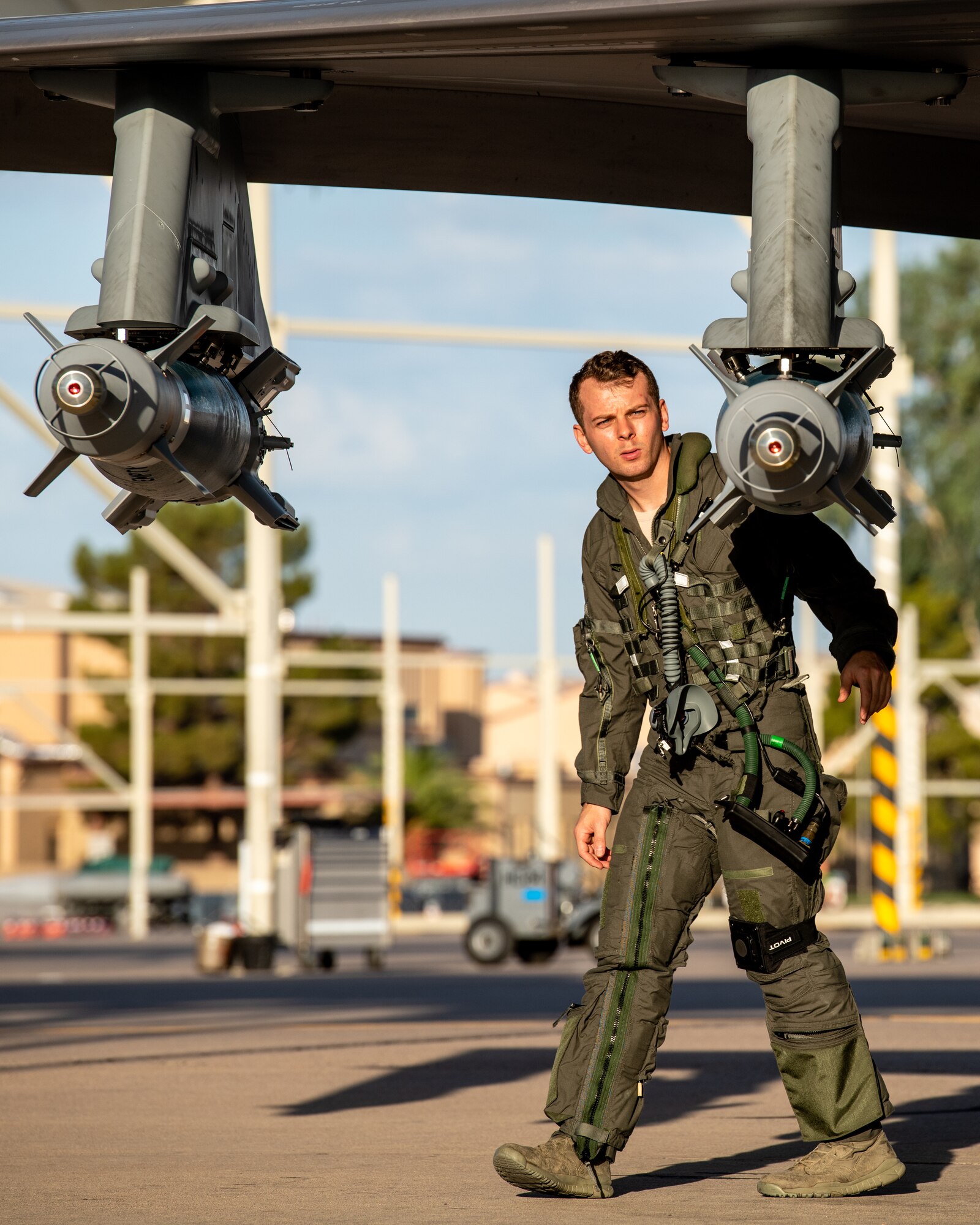 First Lt. Joshua Shook, 63rd Fighter Squadron F-35A Lightning II pilot, inspects an inert GBU-12 laser-guided bomb during a pre-flight inspection July 22, 2020, at Luke Air Force Base, Ariz.