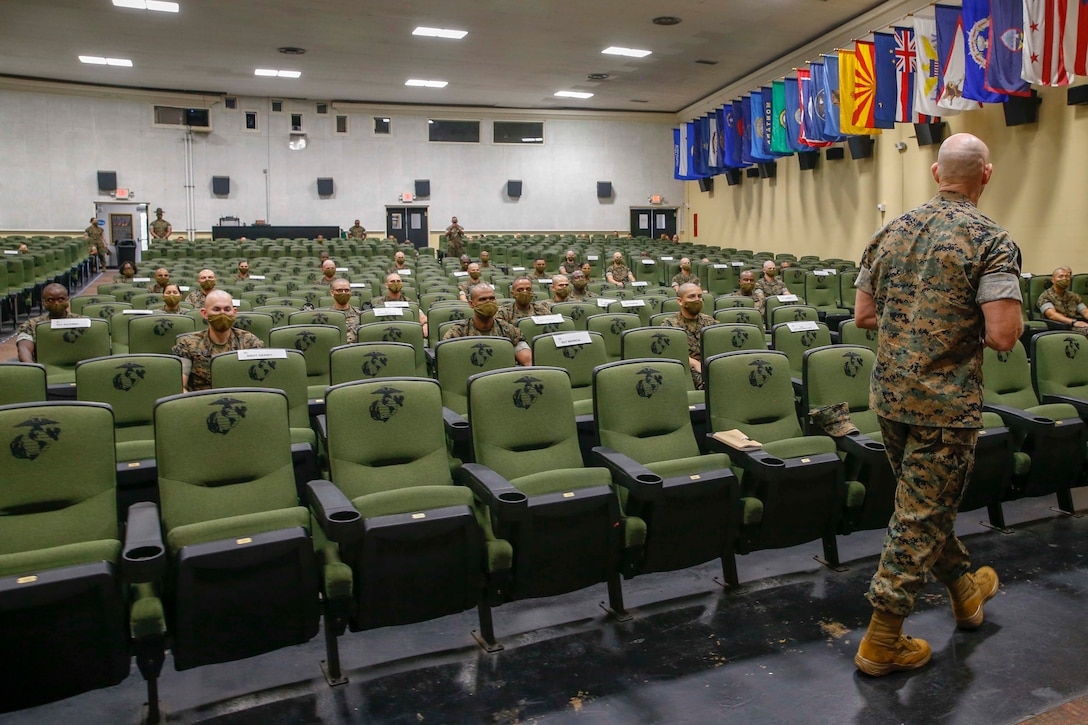 The 19th Sergeant Major of the Marine Corps, Sgt. Maj. Troy E. Black addresses the Marines attending the Drill Instructor School at Marine Corps Recruit Depot (MCRD) Parris Island, South Carolina, July 22, 2020. During the visit Sgt. Maj. Black toured the training facilities to observe changes made keep recruits and Drill Instructors safe during COVID-19 restrictions. The changes include the use of face masks when less than six feet apart, and smaller platoon sizes in addition to the 14 days of restriction of movement before new recruits start training. (U.S. Marine Corps photo by Sgt. Victoria Ross)