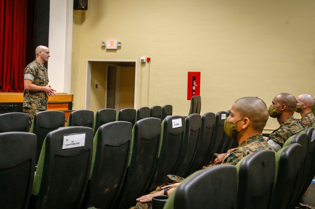 The 19th Sergeant Major of the Marine Corps, Sgt. Maj. Troy E. Black addresses the Marines attending the Drill Instructor School at Marine Corps Recruit Depot (MCRD) Parris Island, South Carolina, July 22, 2020. During the visit Sgt. Maj. Black toured the training facilities to observe changes made keep recruits and Drill Instructors safe during COVID-19 restrictions. The changes include the use of face masks when less than six feet apart, and smaller platoon sizes in addition to the 14 days of restriction of movement before new recruits start training. (U.S. Marine Corps photo by Sgt. Victoria Ross)
