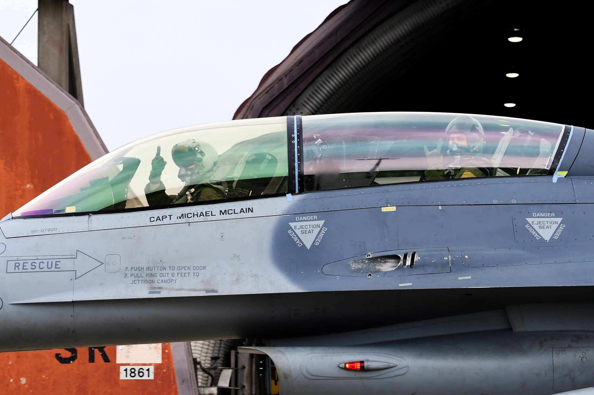 Capt. Louis Bloom, 36th Fighter Squadron F-16 pilot, left, and Maj. Chris Ng, 51st Medical Operations Squadron general surgeon, taxi out to the runway at Osan Air Base, Republic of Korea, July 28, 2020. Both hailing from Randolph, Massachusetts, the Randolph High School graduates continued their friendship while attending the United States Air Force Academy. Rekindling at Osan Air Base, their familiarization flight plans were initially derailed due to Bloom’s motorcycle accident. Ng’s medical expertise was instrumental to Bloom’s full and speedy recovery during the surgical and rehabilitation process, ultimately resulting in finally flying together.  (U.S. Air Force photo by Senior Airman Noah Sudolcan)