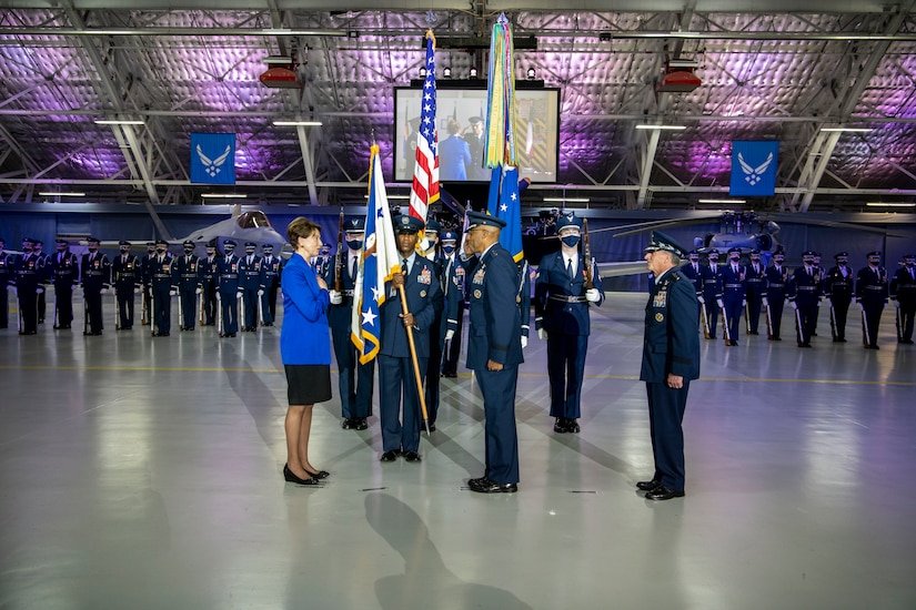 People participate in a  military ceremony.