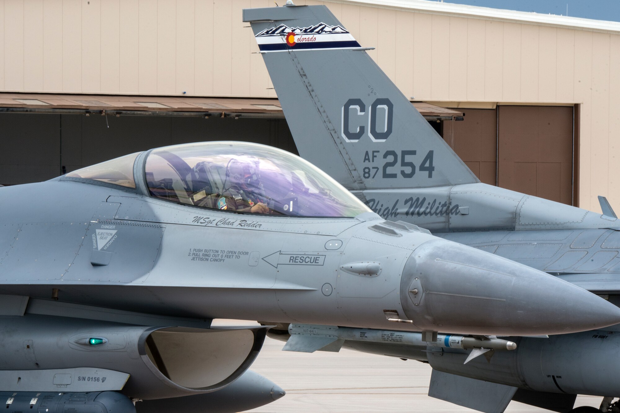 Pilot in cockpit preparing for take off