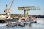 USS Pittsburgh (SSN 720), a Los Angeles-class fast-attack nuclear submarine, is moved to the Mooring Alpha storage area after completing its inactivation process Aug. 5, 2020, at Puget Sound Naval Shipyard & Intermediate Maintenance Facility in Bremerton, Washington. (PSNS & IMF photo by Scott Hansen)