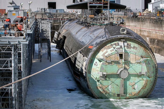 Shipyard workers prepare to move USS Pittsburgh (SSN 720) to the Mooring Alpha storage area after the Los Angeles-class, fast-attack nuclear submarine completed its inactivation process Aug. 5, 2020, at Puget Sound Naval Shipyard & Intermediate Maintenance Facility in Bremerton, Washington. (PSNS & IMF photo by Scott Hansen)