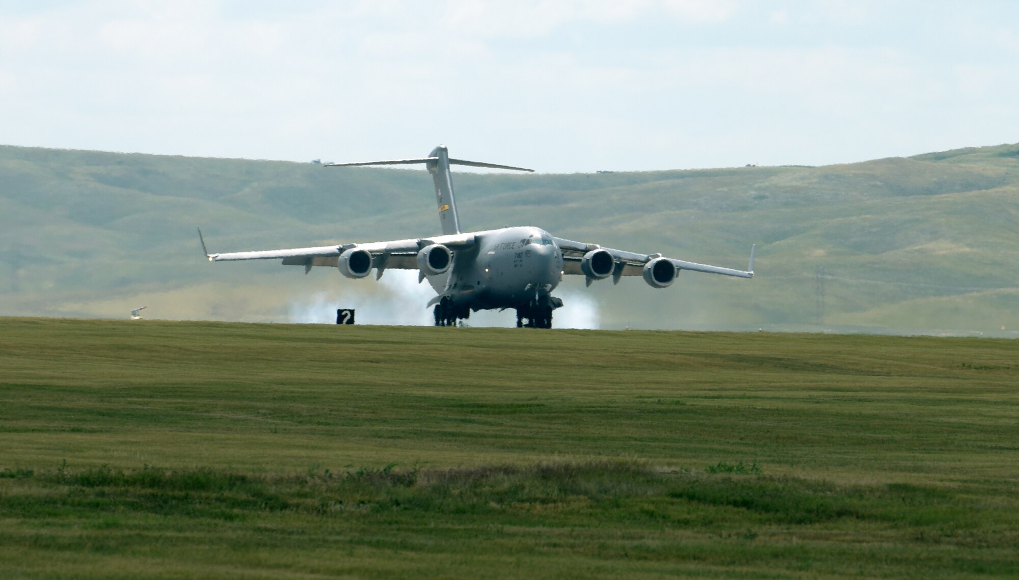 Airplane touches down on runway