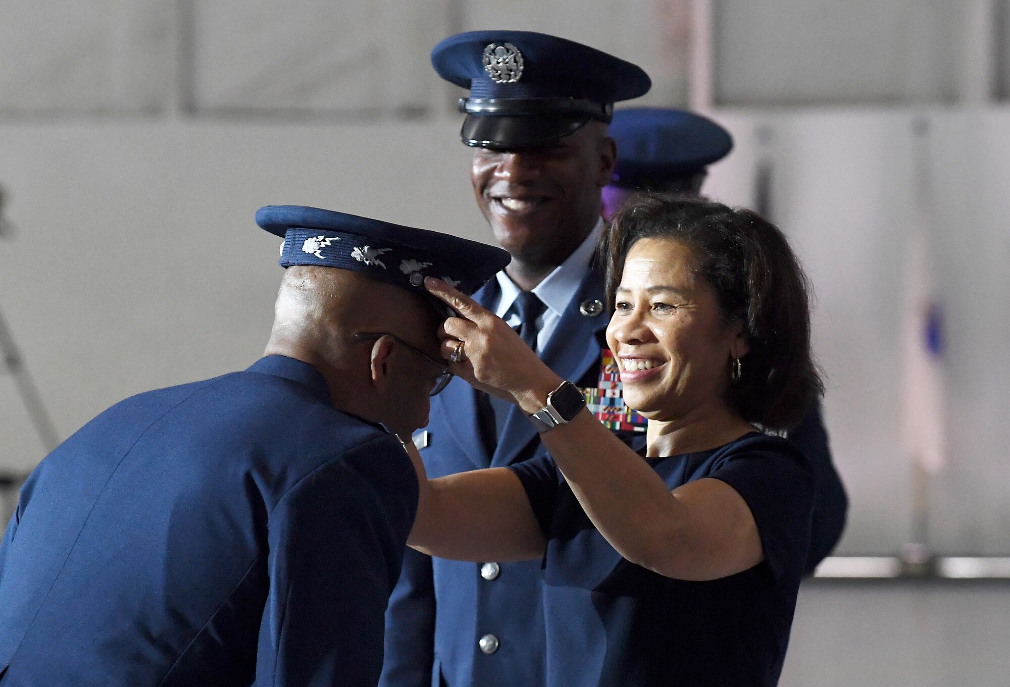 Sharene Brown, spouse of incoming Air Force Chief of Staff Gen. Charles Q. Brown Jr., presents the official Air Force Chief of Staff service cap to her husband during the CSAF transition ceremony at Joint Base Andrews, Md., Aug. 6, 2020. Brown is the 22nd Chief of Staff of the Air Force. (U.S. Air Force photo by Staff Sgt. Chad Trujillo)