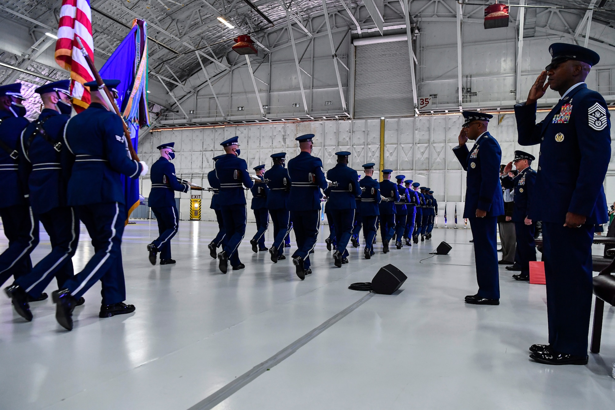The Air Force Honor Guard performs a pass in review in front of Air Force Chief of Staff Gen. Charles Q. Brown Jr. during a transition ceremony at Joint Base Andrews, Md., Aug. 6, 2020. Brown replaced Gen. David L. Goldfein as the 22nd chief of staff. (U.S. Air Force photo by Eric Dietrich)
