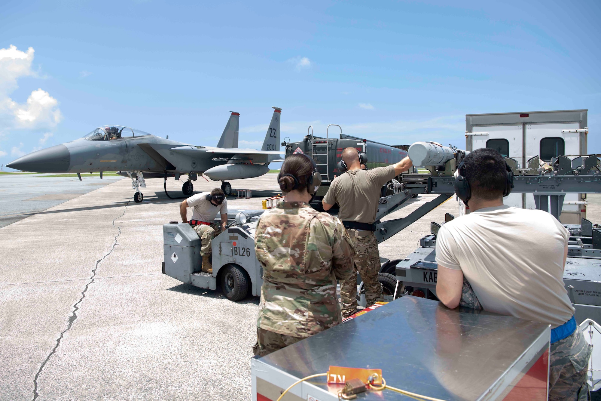 Team Kadena Airmen perform an Integrated Combat Turn during Exercise WestPac Rumrunner at Kadena Air Base, Japan, July 31, 2020. The WestPac Rumrunner exercise brought Airmen and joint partners together to train and execute innovative ways to deploy forces in a contested environment.