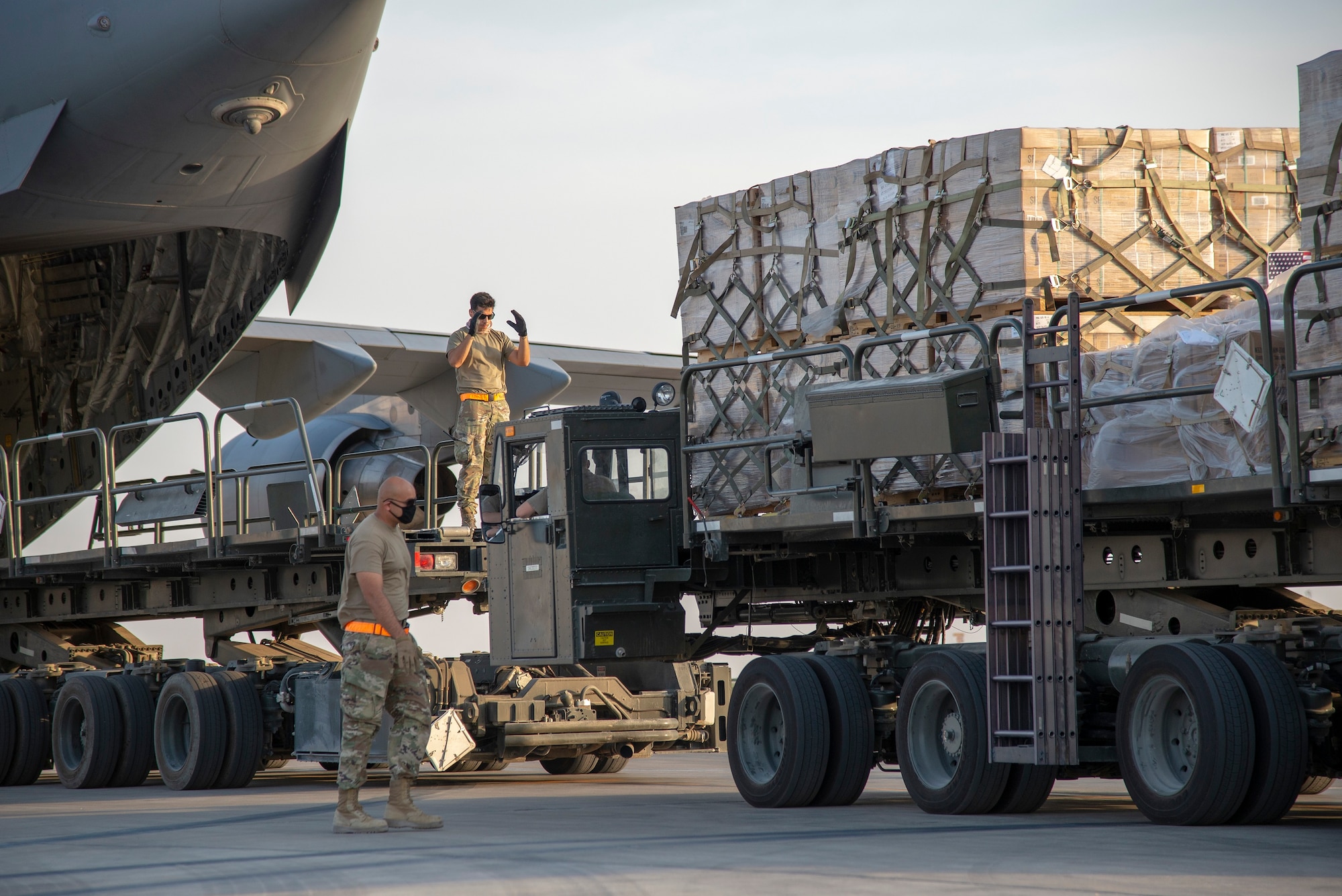 U.S. Air Force Airmen load humanitarian aid supplies a U.S. Air Force C-17 Globemaster III at Al Udeid Air Base, Qatar, Aug. 6, 2020, bound for Beirut, Lebanon. U.S. Central Command is coordinating with the Lebanese Armed Forces and U.S. Embassy-Beirut to transport critical supplies as quickly as possible to support the needs of the Lebanese people. (U.S. Air Force photo by Staff Sgt. Heather Fejerang)