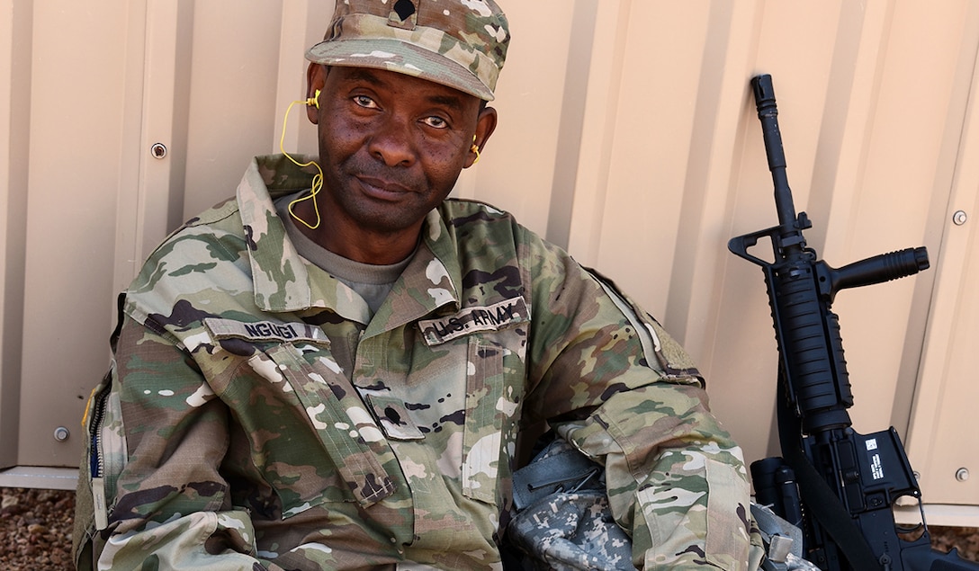 Spc. Gerald Ngugi, a light-wheeled mechanic with 2nd Space Battalion, 1st Space Brigade, Colorado Springs, Colo., takes a break after qualifying at a weapons range at Fort Carson, Colo., Aug. 1, 2020. (U.S. Army photo by Staff Sgt. Aaron Rognstad)