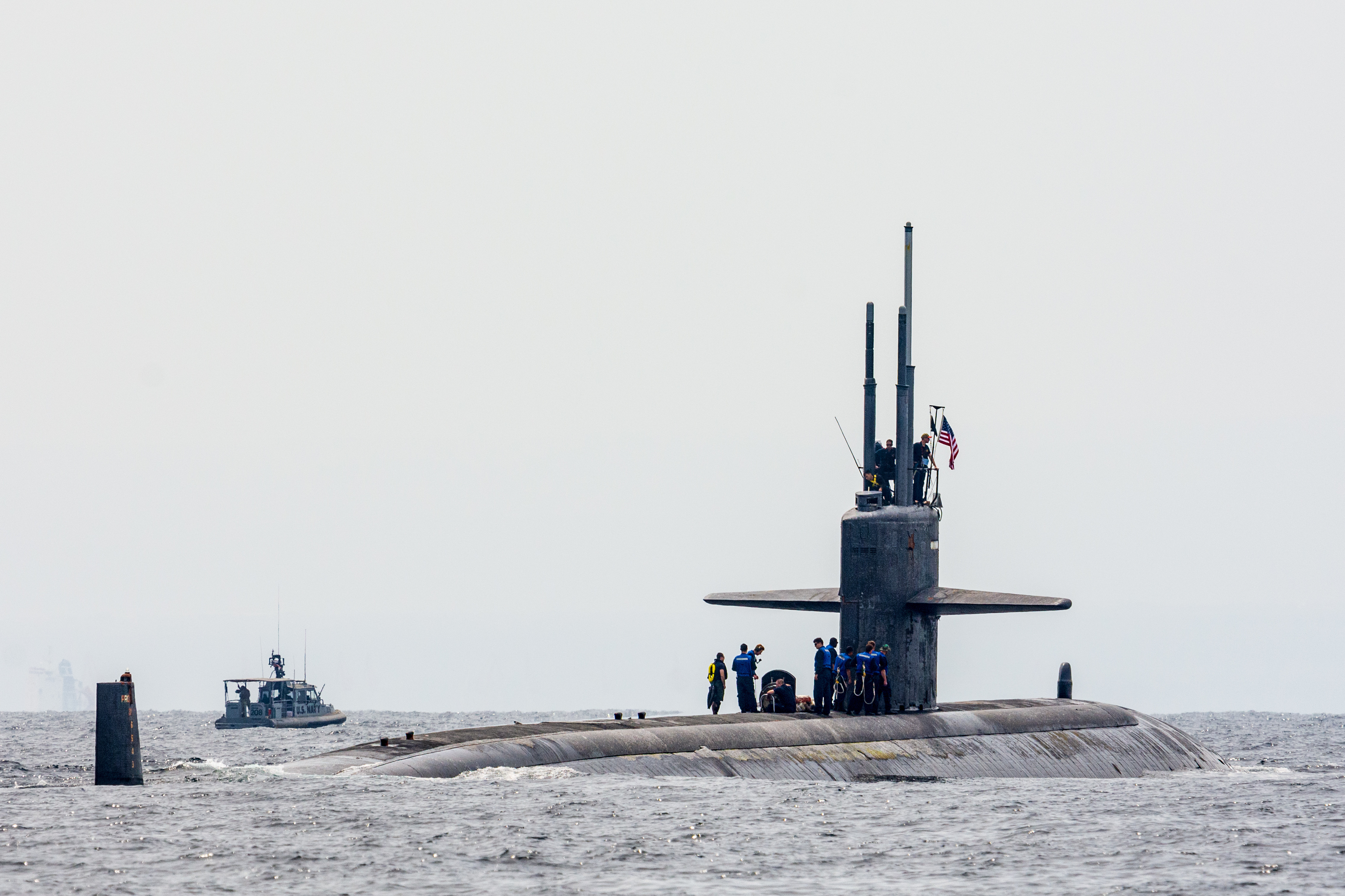 The Los Angeles-class attack submarine USS Newport News (SSN 750) conducts a brief stop for personnel with Coastal Riverine Squadron (CRS) 1 in the Gulf of Tadjoura.