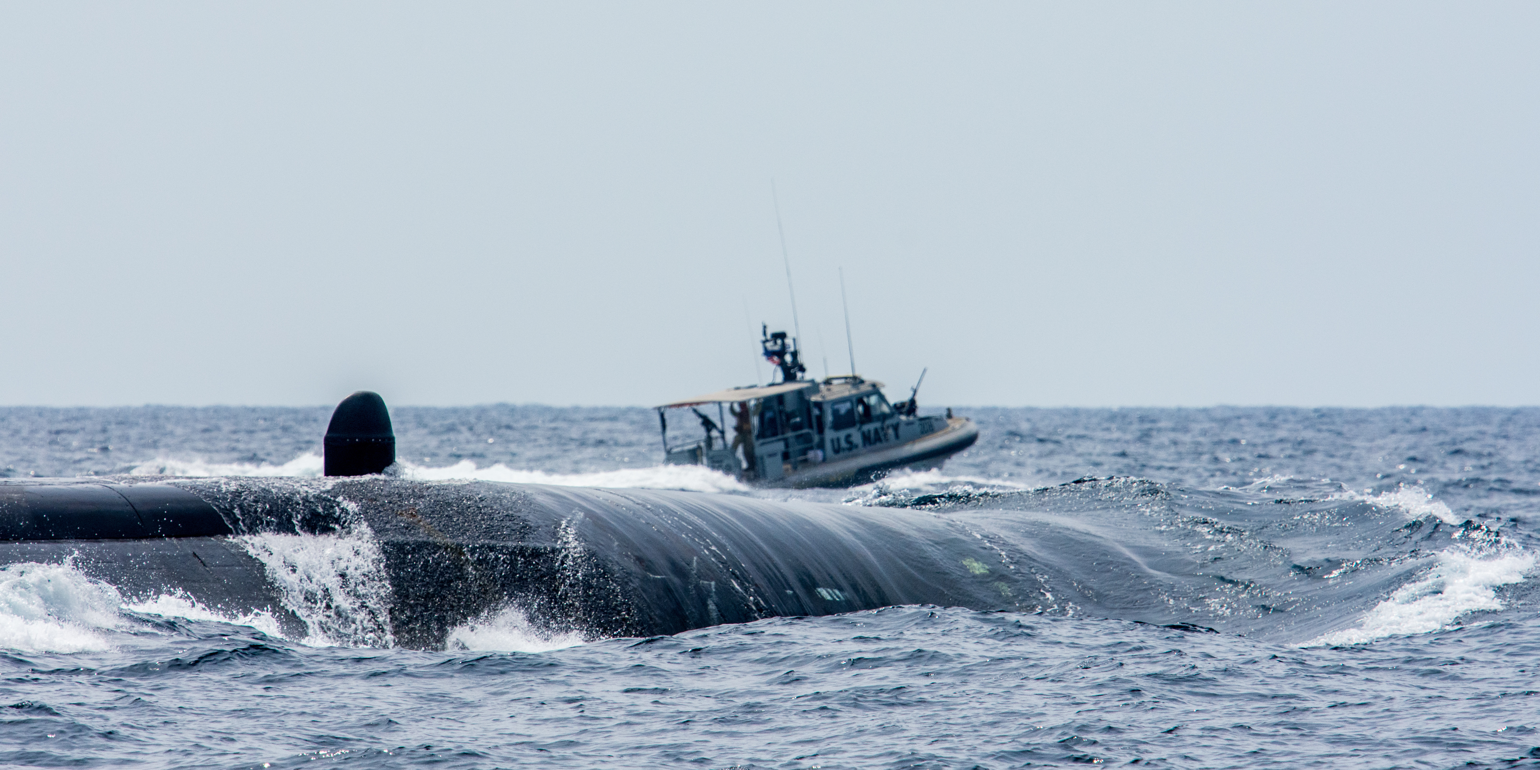 The Los Angeles-class attack submarine USS Newport News (SSN 750) conducts a brief stop for personnel with Coastal Riverine Squadron (CRS) 1 in the Gulf of Tadjoura.