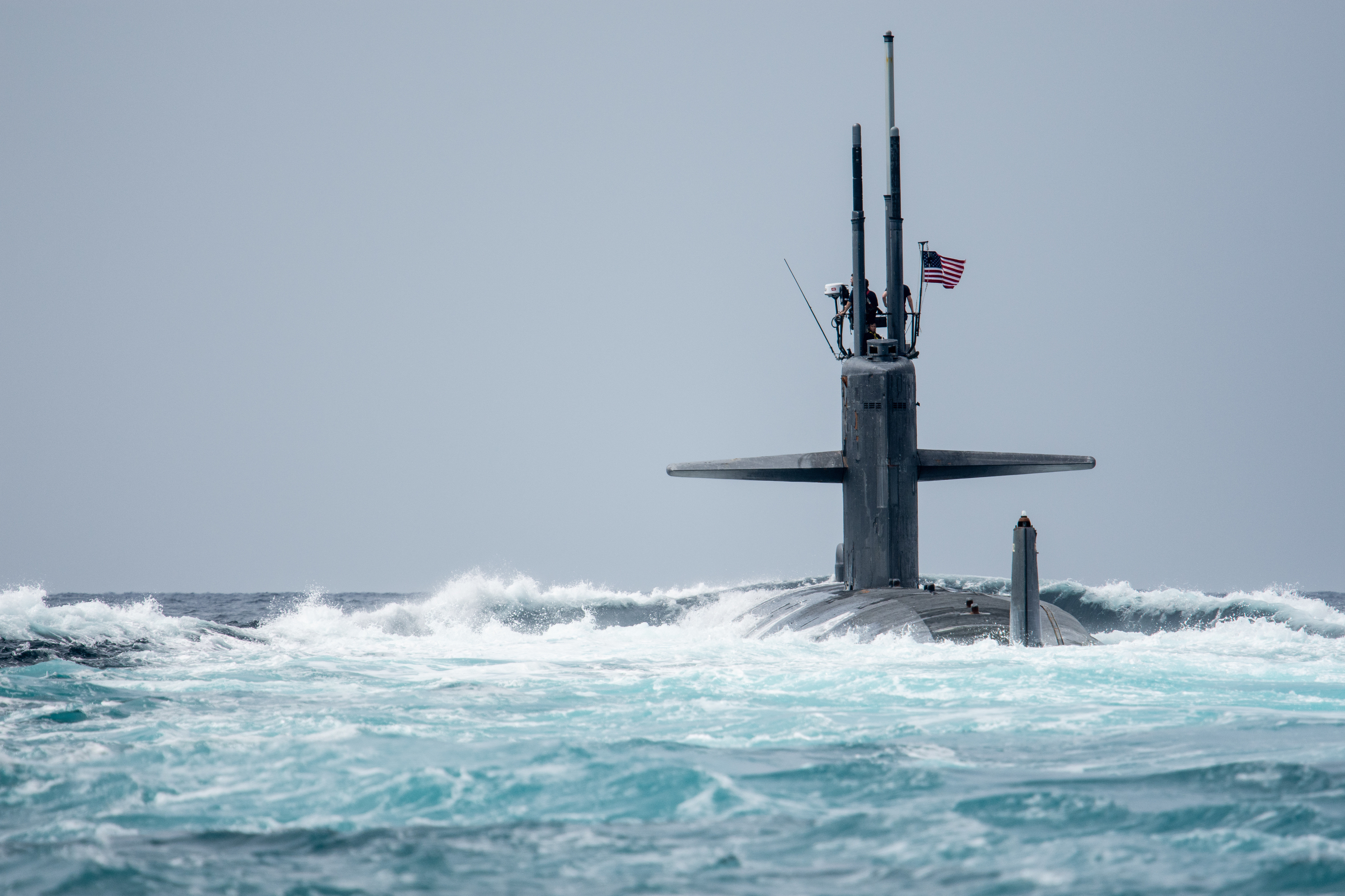 The Los Angeles-class attack submarine USS Newport News (SSN 750) conducts a brief stop for personnel with Coastal Riverine Squadron (CRS) One in the Gulf of Tadjoura.