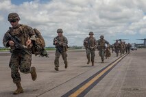 Marines with Company E, 2nd Battalion, 4th Marines run to board a MV22B Osprey during aviation integration training at Futenma Air Station, Okinawa, Japan, June 29, 2020. The training was conducted with Marine Medium Tiltrotor Squadron 262, Reinforced, to increase Interoperability (Interop) training. Interop enhances coordination and familiarizes subordinate elements with the unique mission set of the 31st Marine Expeditionary Unit (MEU). The 31st MEU, the Marine Corps’ only continuously forward-deployed MEU, provides a flexible and lethal force ready to perform a wide range of military operations as the premier crisis response force in the Indo-Pacific region. (U.S. Marine Corps photo by Sgt. Dominic Clay)