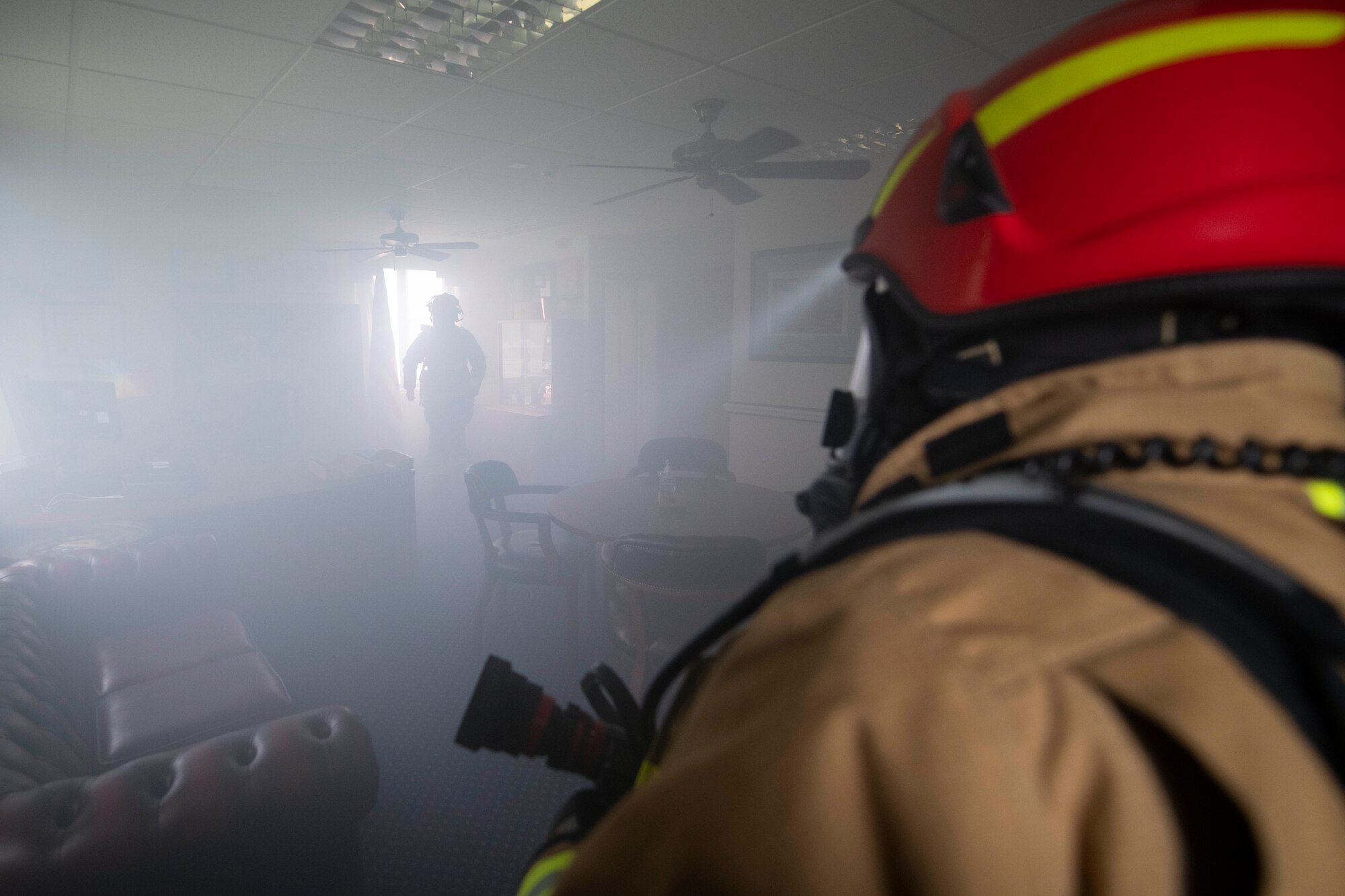The 423rd Civil Engineer Squadron firefighters participate in a readiness exercise at RAF Alconbury, England, August 6, 2020. The exercise tested their response time and preparedness of fire rescue services. (U.S. Air Force photo by Airman 1st Class Jennifer Zima)