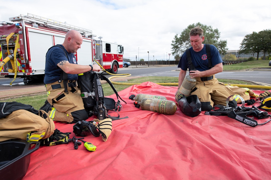 The 423rd Civil Engineer Squadron firefighters participate in a readiness exercise at RAF Alconbury, England, August 6, 2020. The exercise tested their response time and preparedness of fire rescue services. (U.S. Air Force photo by Airman 1st Class Jennifer Zima)