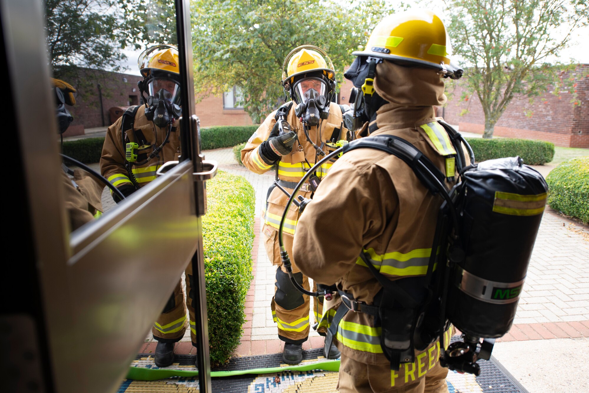 The 423rd Civil Engineer Squadron firefighters participate in a readiness exercise at RAF Alconbury, England, August 6, 2020. The exercise tested their response time and preparedness of fire rescue services. (U.S. Air Force photo by Airman 1st Class Jennifer Zima)