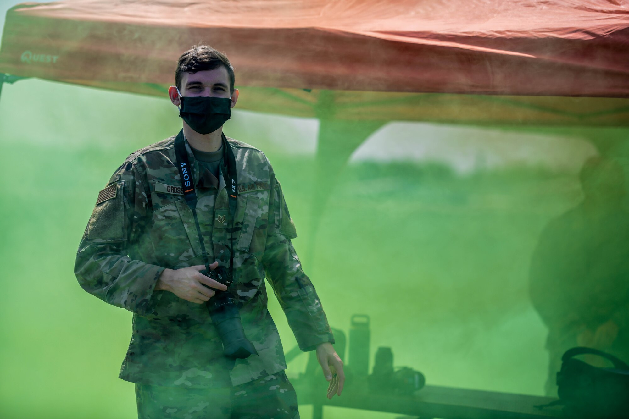 Staff Sgt. Jeffrey Grossi, the NCOIC of Command Information assigned to the 910th Airlift Wing’s Public Affairs Office, documents the 914th Air Refueling Wing and 910th AW training together on M18 smoke grenades and M116A1 burst simulators, August 6, 2020, Youngstown Air Reserve Station, Ohio. As a public affairs Airmen, Grossi's job is to tell the 910th AW's and it's Reserve Citizen Airmen's stories.