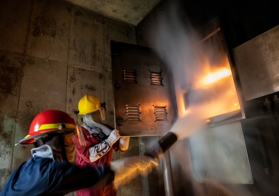 Recruits participate in firefighting and damage control training at Recruit Training Command.