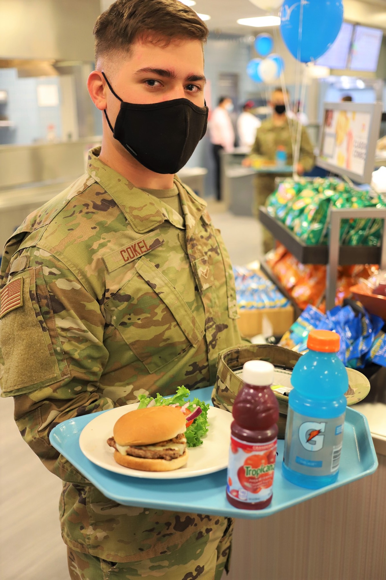 Airman 1st Class Hayden Cokel is ready for lunch at the newly reopened The Beachcombers dining facility at Vandenberg AFB, California, Aug. 6, 2020.