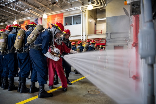 Recruits participate in firefighting and damage control training at Recruit Training Command.