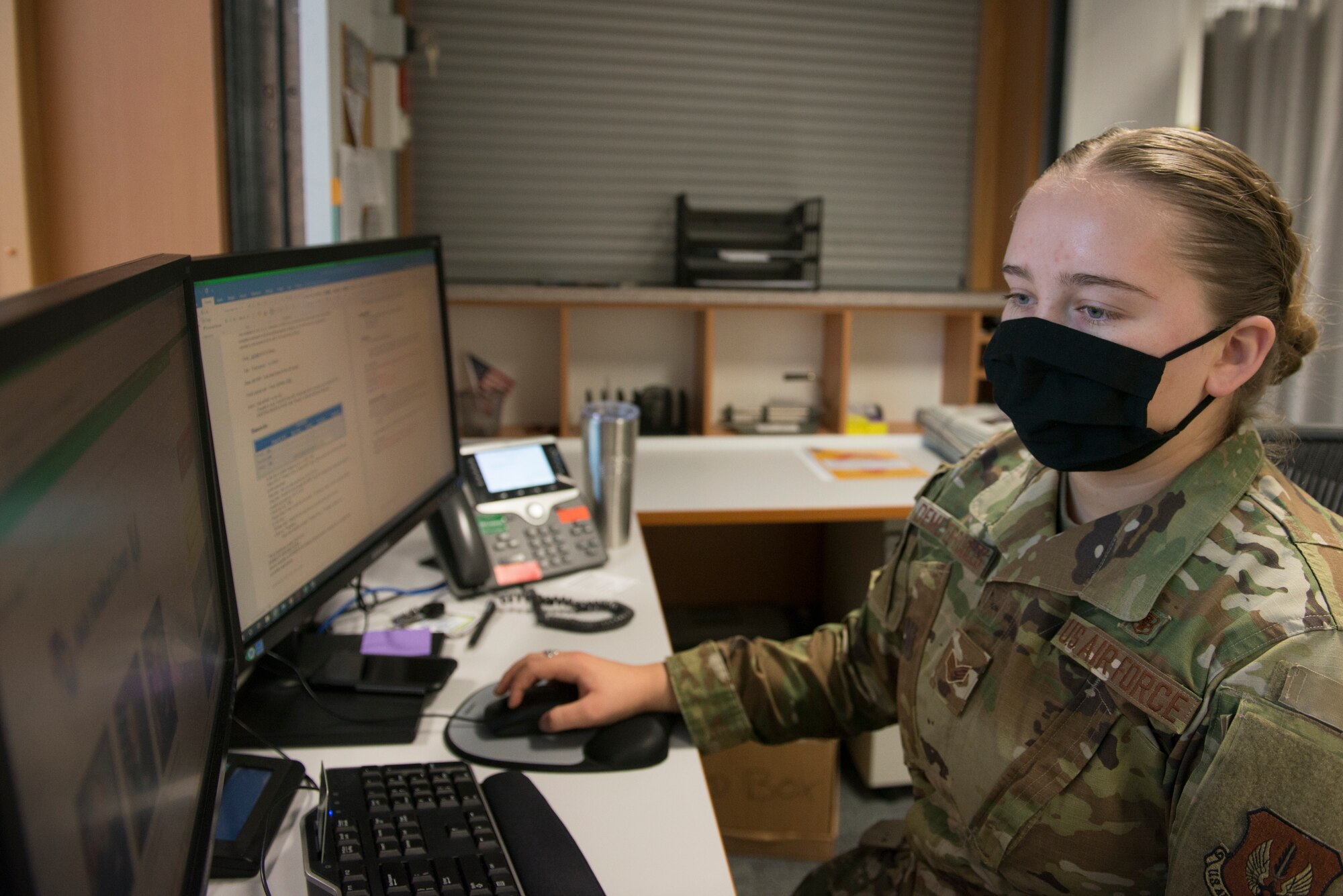 A U.S. Airman works on a computer.