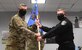 Col. Ian Dinesen, 316th Security Forces Group commander, passes the guidon to Stephen A. Hubbard Jr., who assumed command of the 316th Security Support Squadron during a change of command ceremony at Joint Base Andrews, Md., Aug. 7, 2020.