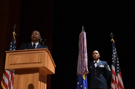 Col. Jaron H. Roux, 437th Airlift Wing commander, makes his inaugural speech as wing commander beside Command Chief Master Sgt. Charmaine Kelley, 437th AW command chief, at Joint Base Charleston, S.C. Aug. 7, 2020. The 437th AW deploys Airmen and aircraft worldwide in support of contingency operations that involve air-to-land and airdrop delivery of forces, equipment and supplies. These missions support combat operations, Joint Chiefs of Staff directed special operations missions and United States sponsored humanitarian relief efforts. (U.S. Air Force Photo by Senior Airman Joshua R. Maund)