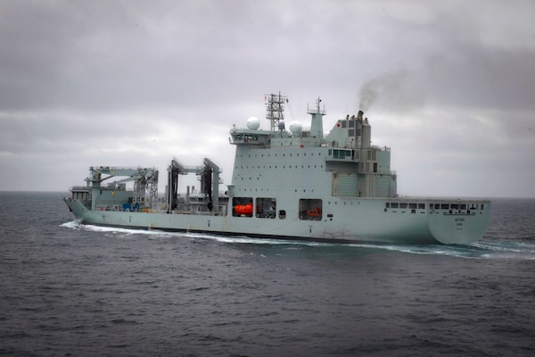 The Arleigh Burke-class guided-missile destroyer USS Thomas Hudner (DDG 116) breaks away from Royal Canadian ship MV Asterix during a replenishment-at-sea approach drill, Aug. 5, 2020.