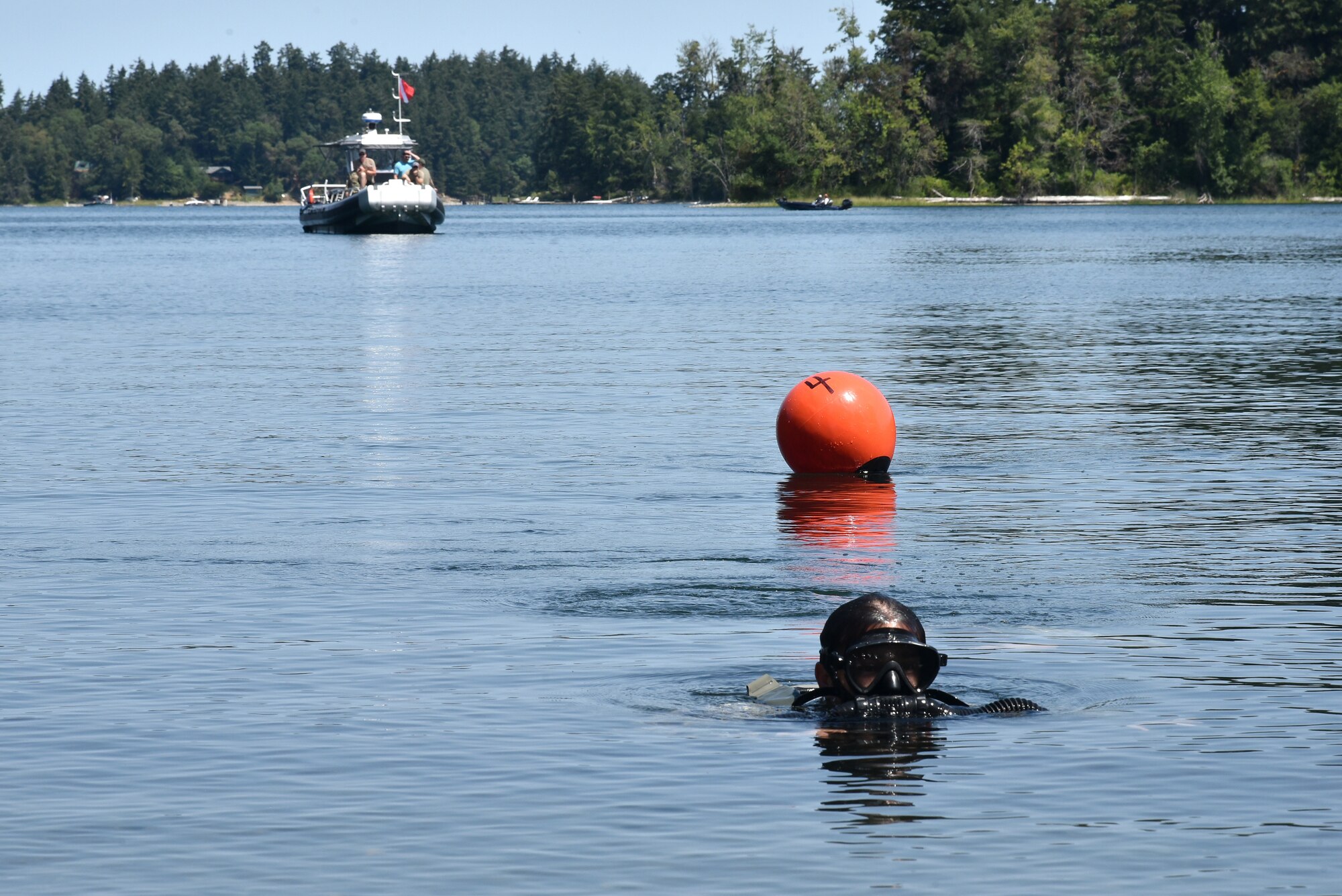 U.S. Air Force 125th Special Tactics Airmen from the Portland Air National Guard Base, along with members of joint forces, participate in closed-circuit dive training at Joint Base Lewis McChord, Wash., July 31, 2020.  Special Tactics operators were conducted dives and training on new equipment.