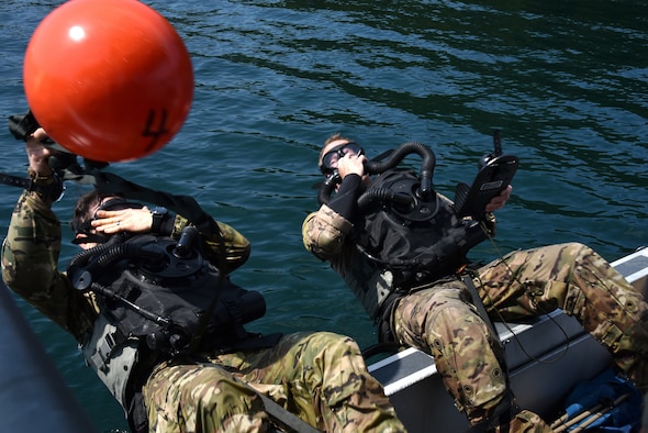 U.S. Air Force 125th Special Tactics Airmen from the Portland Air National Guard Base, along with members of joint forces, participate in closed-circuit dive training at Joint Base Lewis McChord, Wash., July 31, 2020.  Special Tactics operators conducted recurrency dives and training on new equipment.
