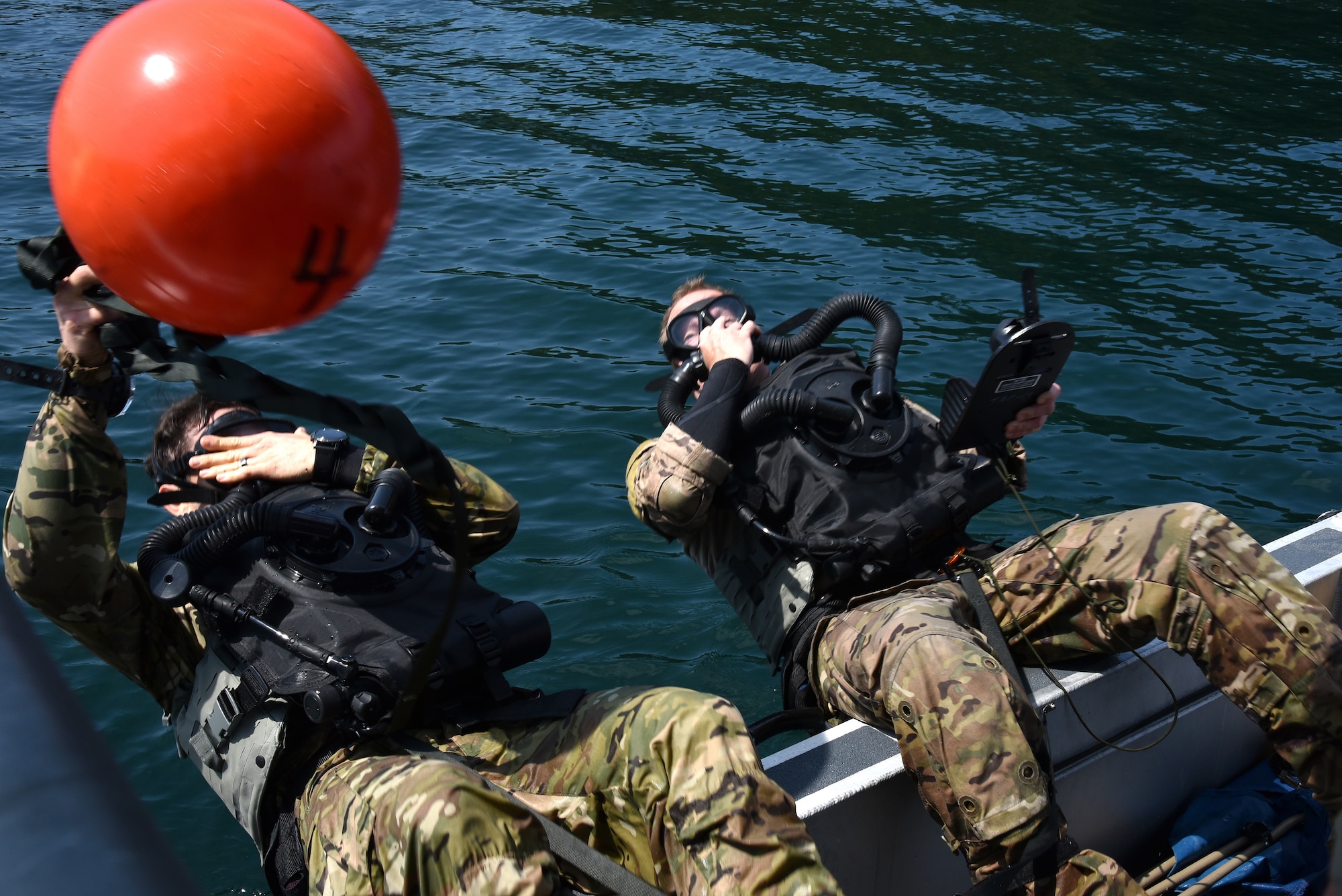 U.S. Air Force 125th Special Tactics Airmen from the Portland Air National Guard Base, along with members of joint forces, participate in closed-circuit dive training at Joint Base Lewis McChord, Wash., July 31, 2020.  Special Tactics operators conducted recurrency dives and training on new equipment.