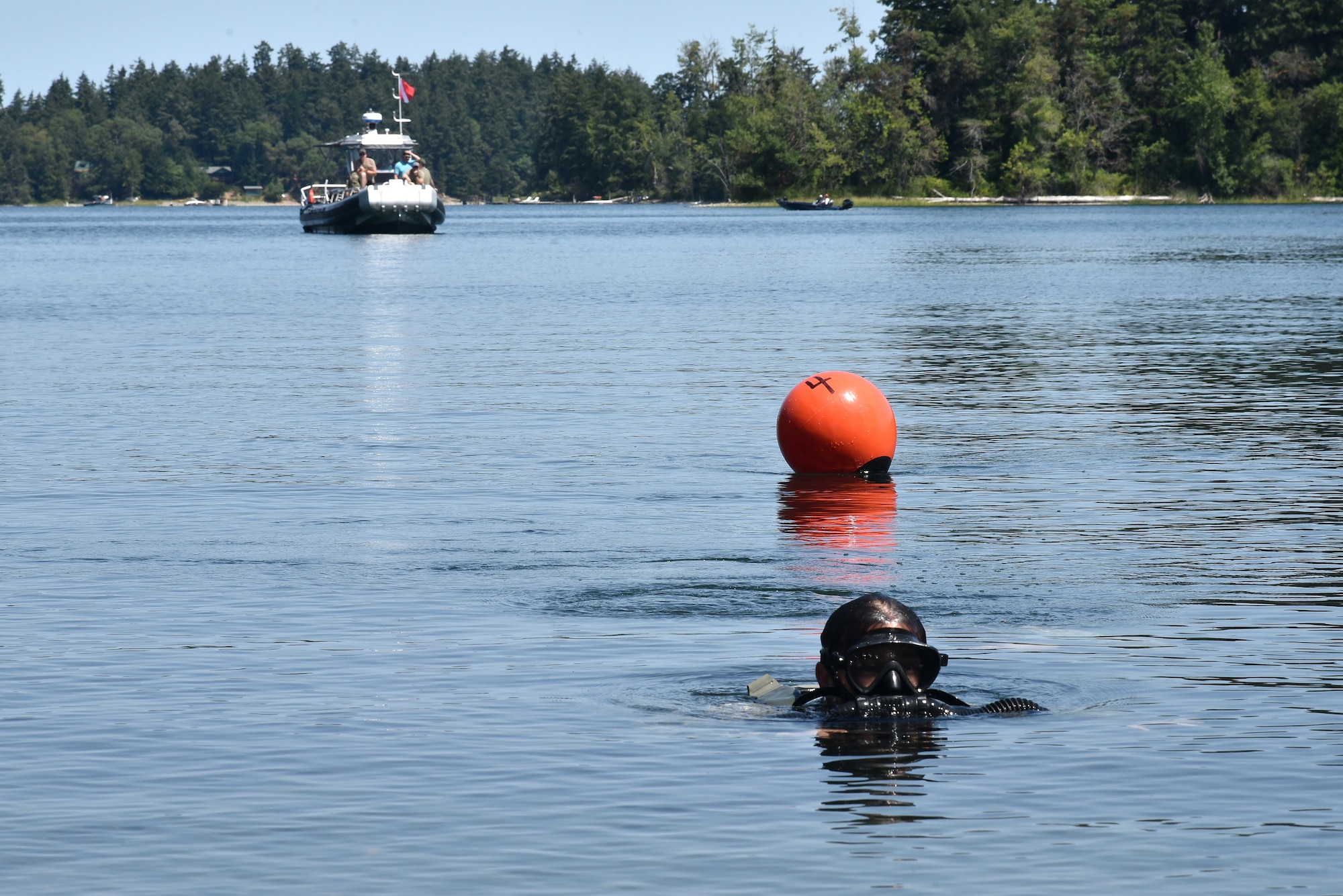 U.S. Air Force 125th Special Tactics Airmen from the Portland Air National Guard Base, along with members of joint forces, participate in closed-circuit dive training at Joint Base Lewis McChord, Wash., July 31, 2020.  Special Tactics operators were conducted dives and training on new equipment.